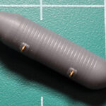 M-81 frag body with added mounting lugs from wire